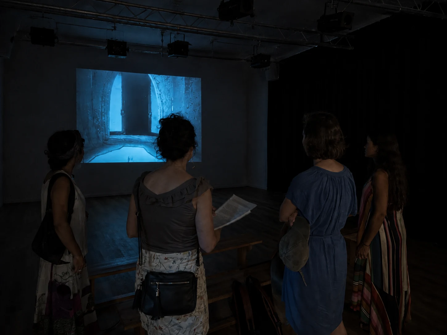 Audience viewing Fascinating Fascism in the exhibition space